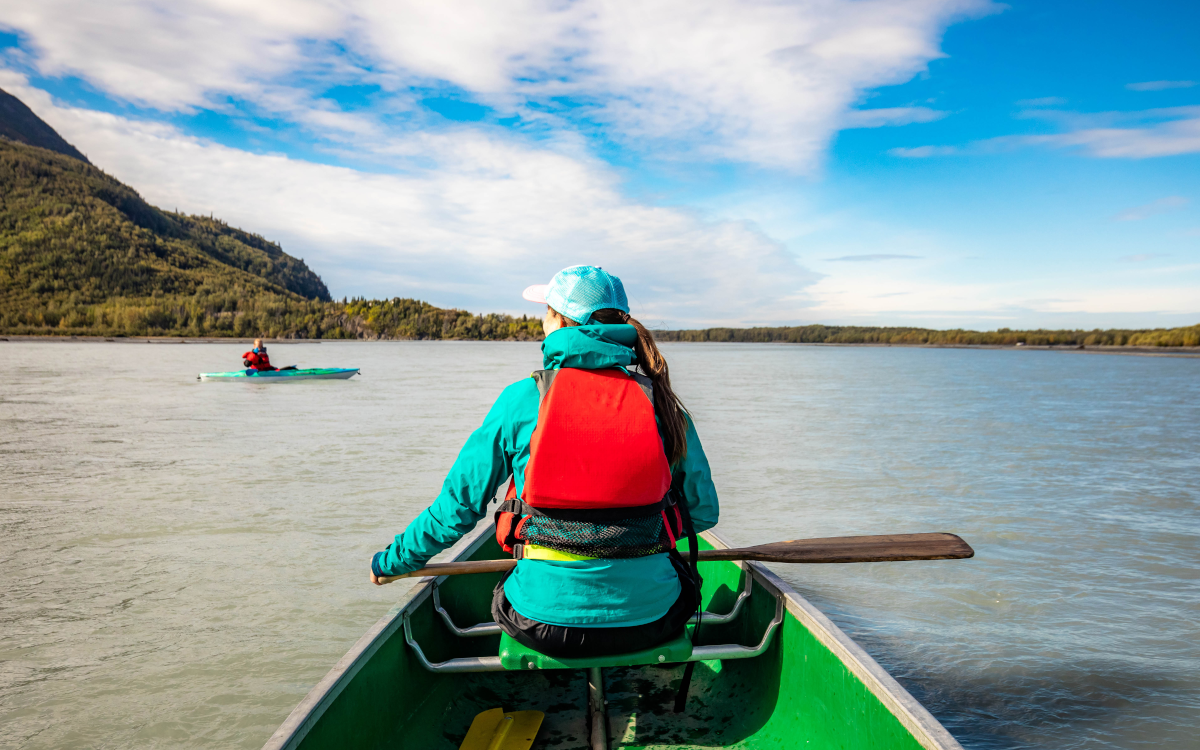 woman in a boat on a lake