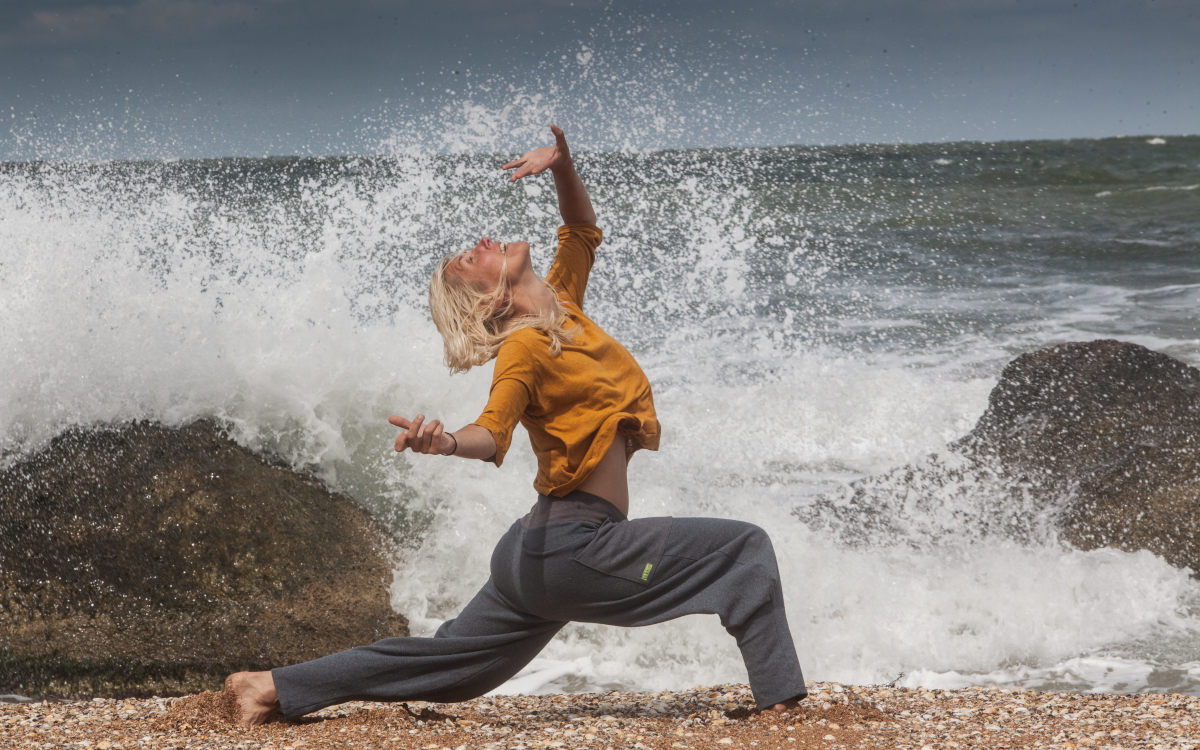 woman dancing on cliffs