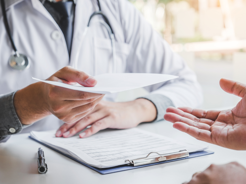 Doctor giving a prescription