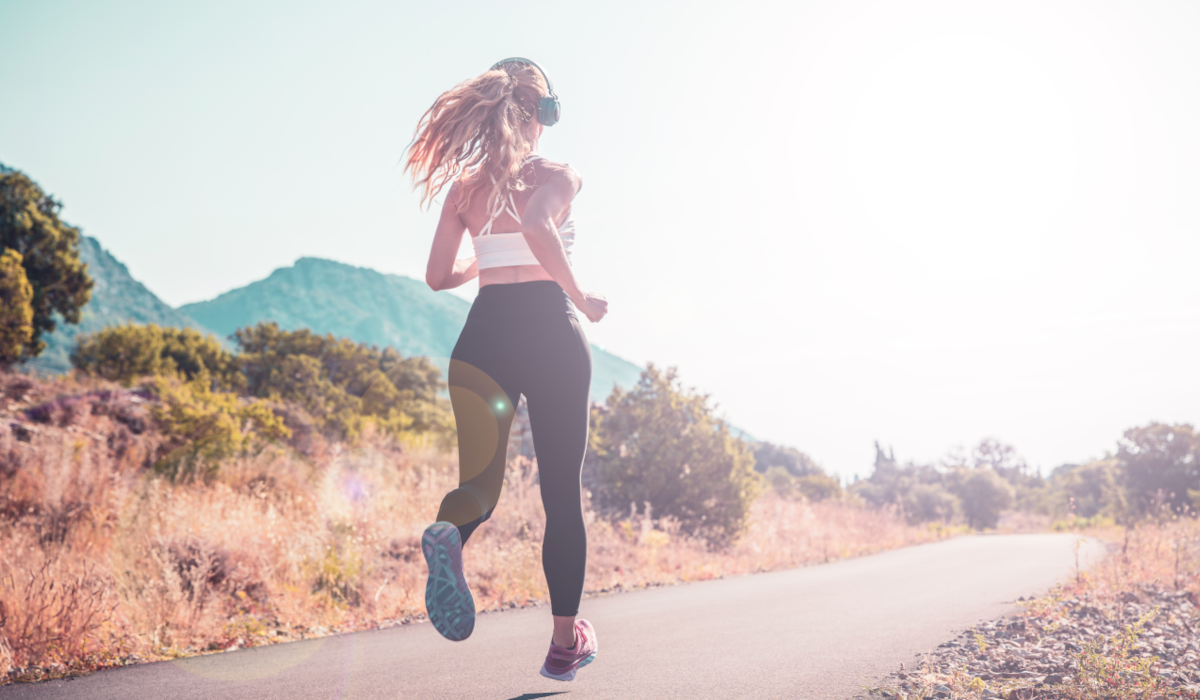 woman running with headphones