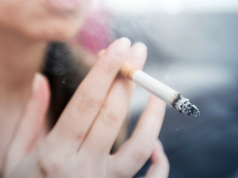 woman smoking a cigarette